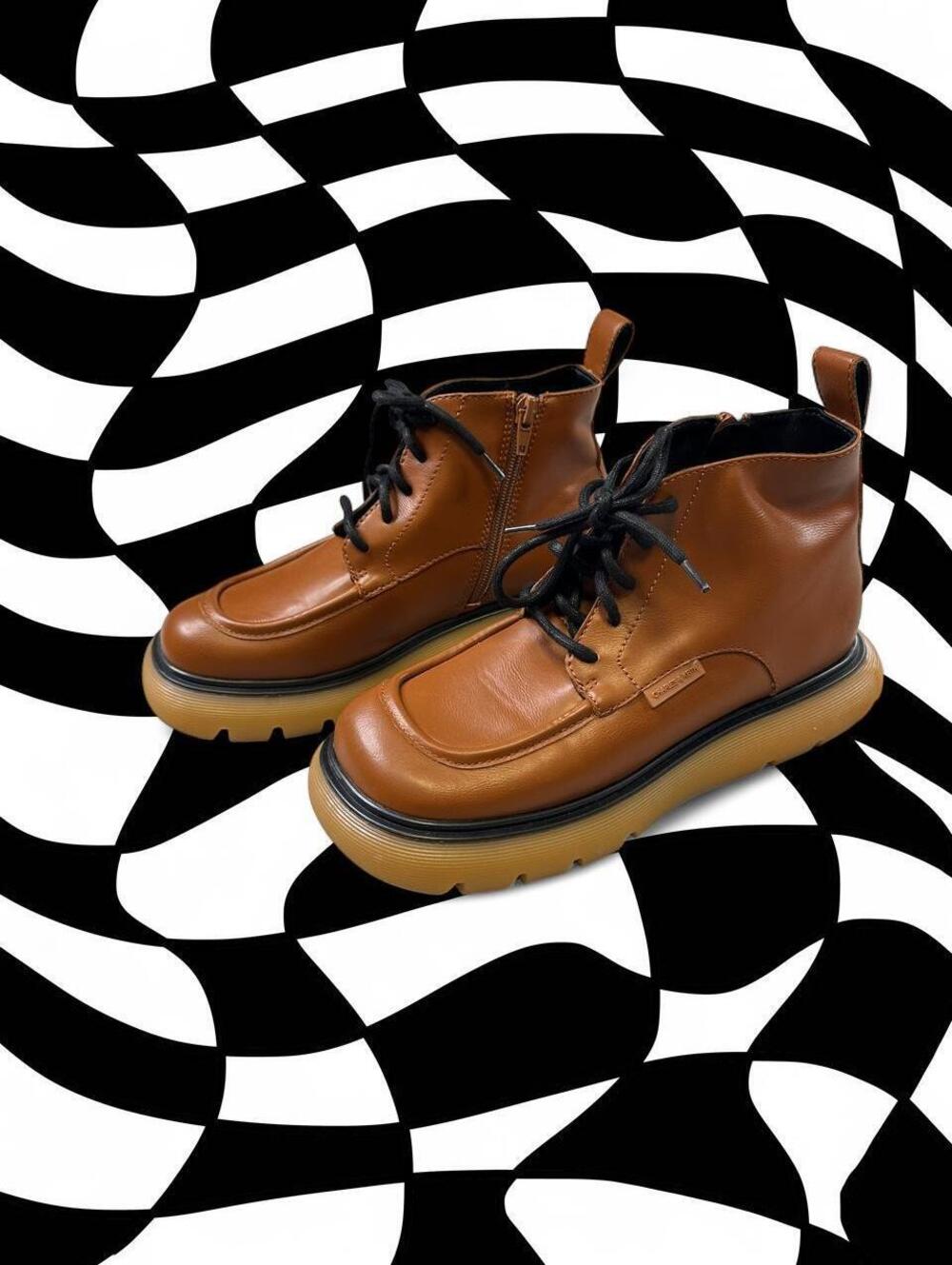 Charles & Keith Brown leather ankle boots with chunky sole and lace-up design